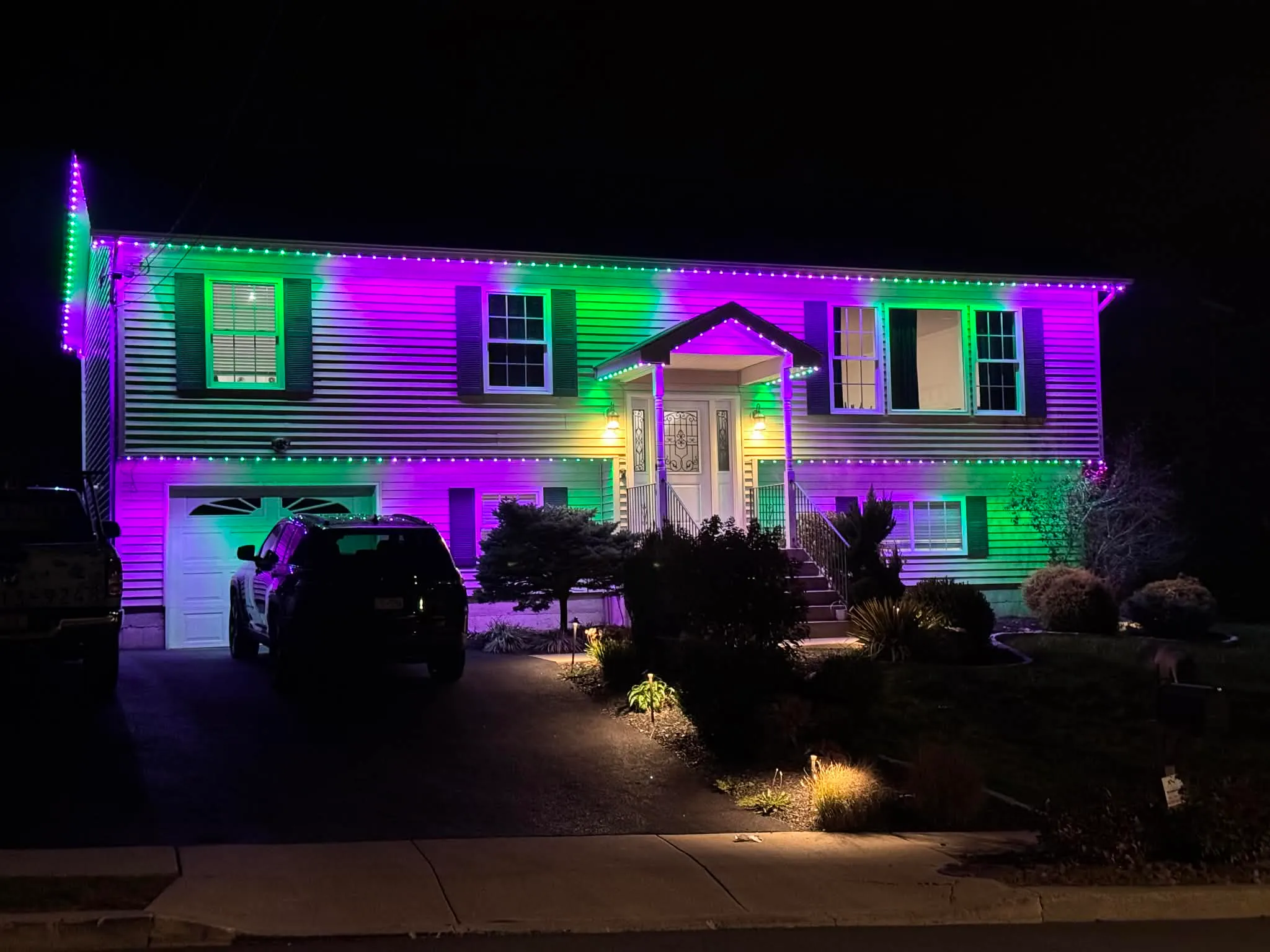 Custom permanent LED home lighting system at night